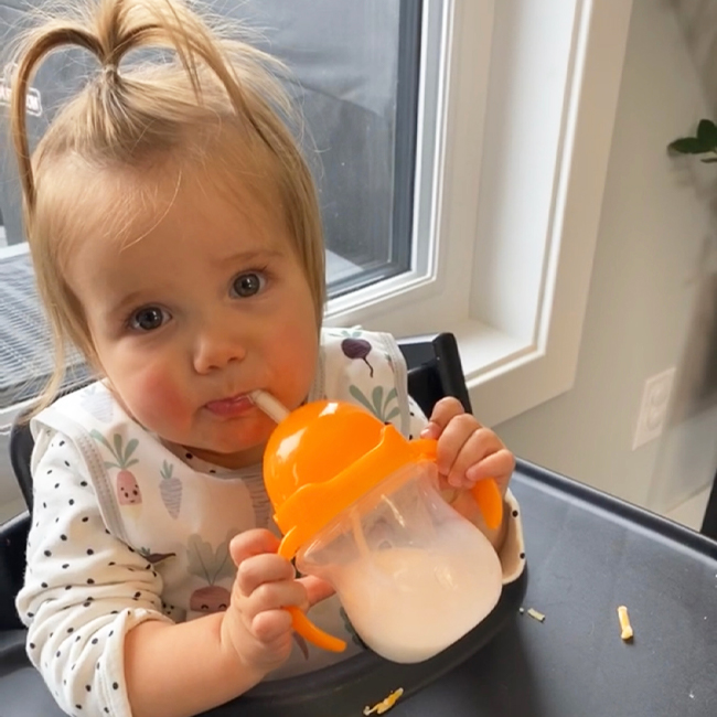 Introducing an Open Cup or Sippy Cup with a Straw To Your Baby